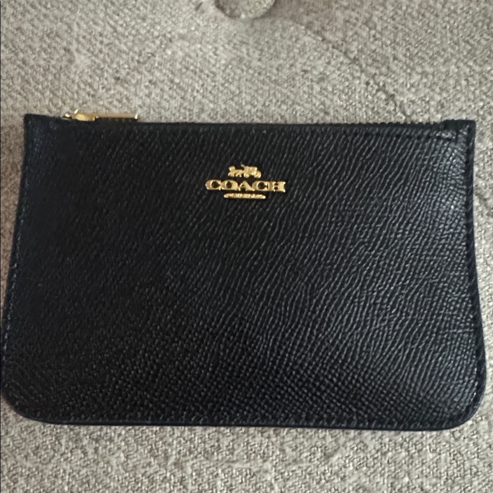 Like New, Coach black  zip card case.